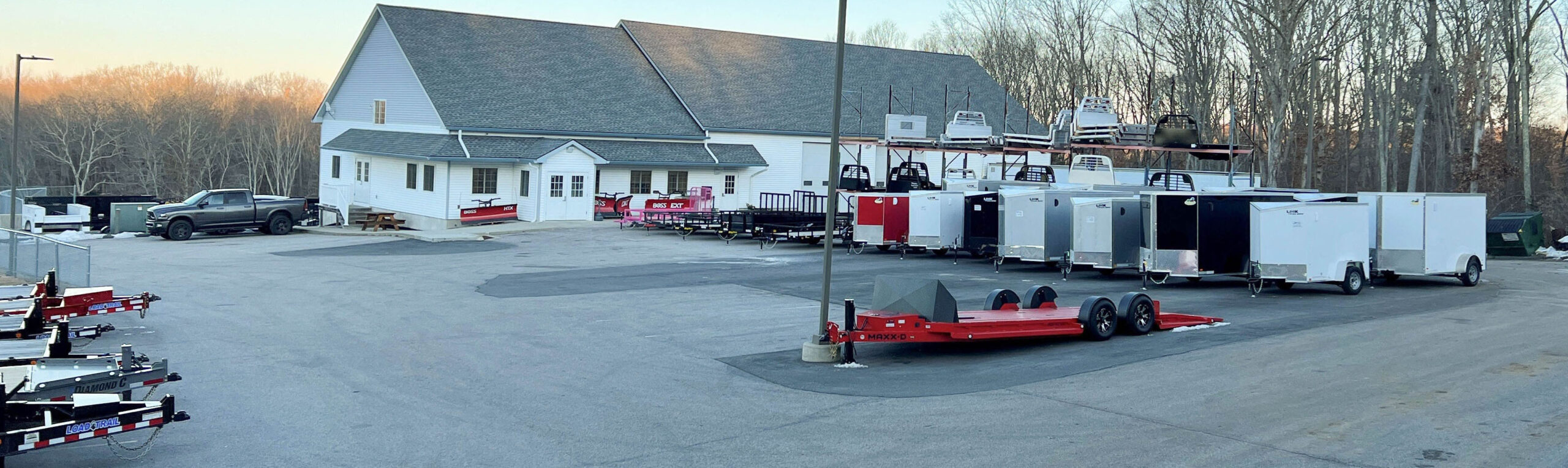 B.H. Trailers and Plows Lot