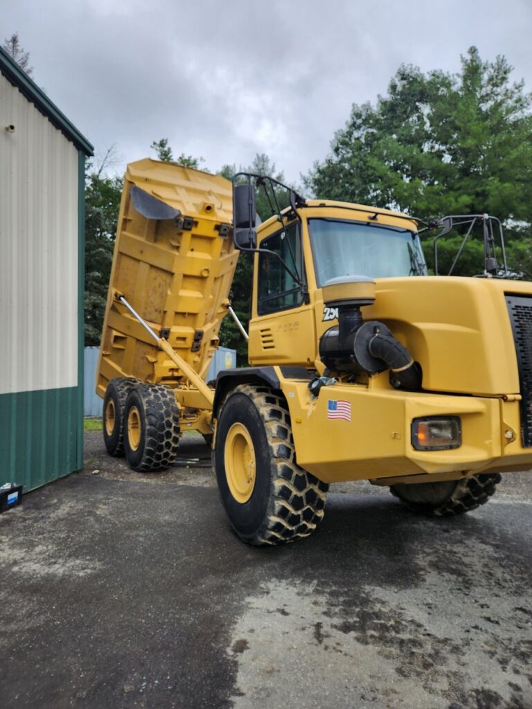 2003 John Deere 250D Articulated Dump Truck Excellent Condition 7669 Hours Pre-Emission Truck Enclosed Cab Heat and A/C Priced to Sell: $84,900